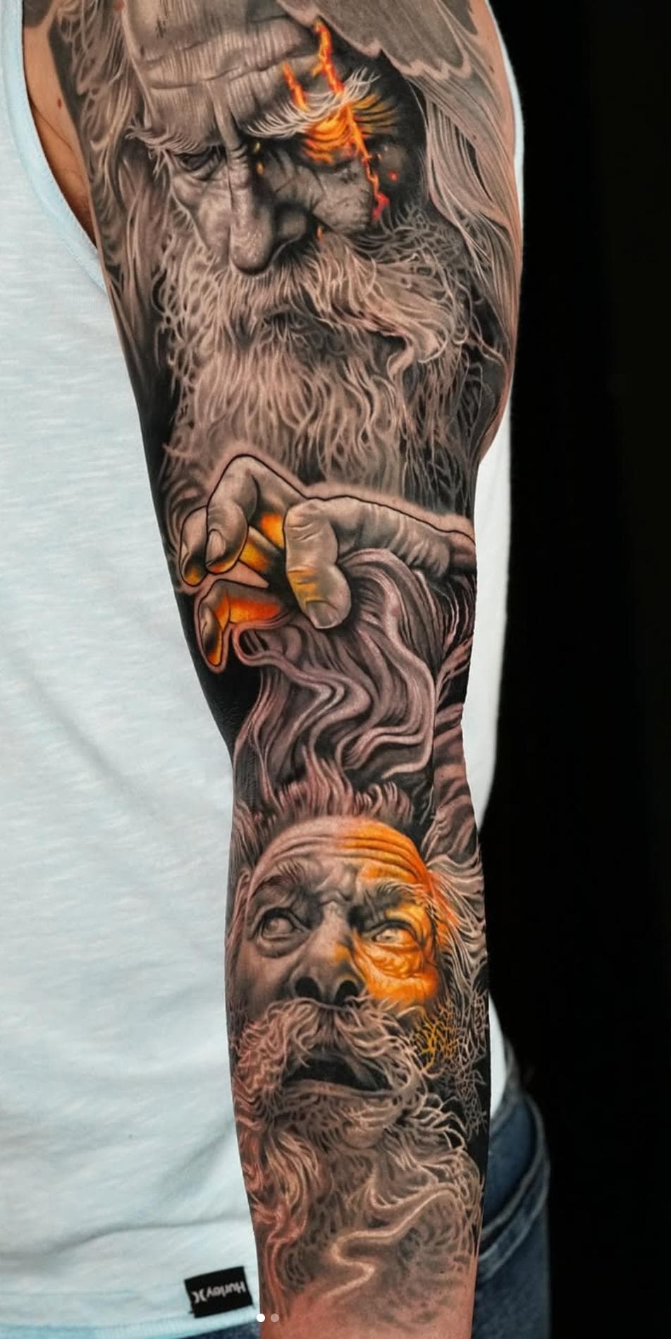 Black and grey realistic portrait sleeve with orange highlights